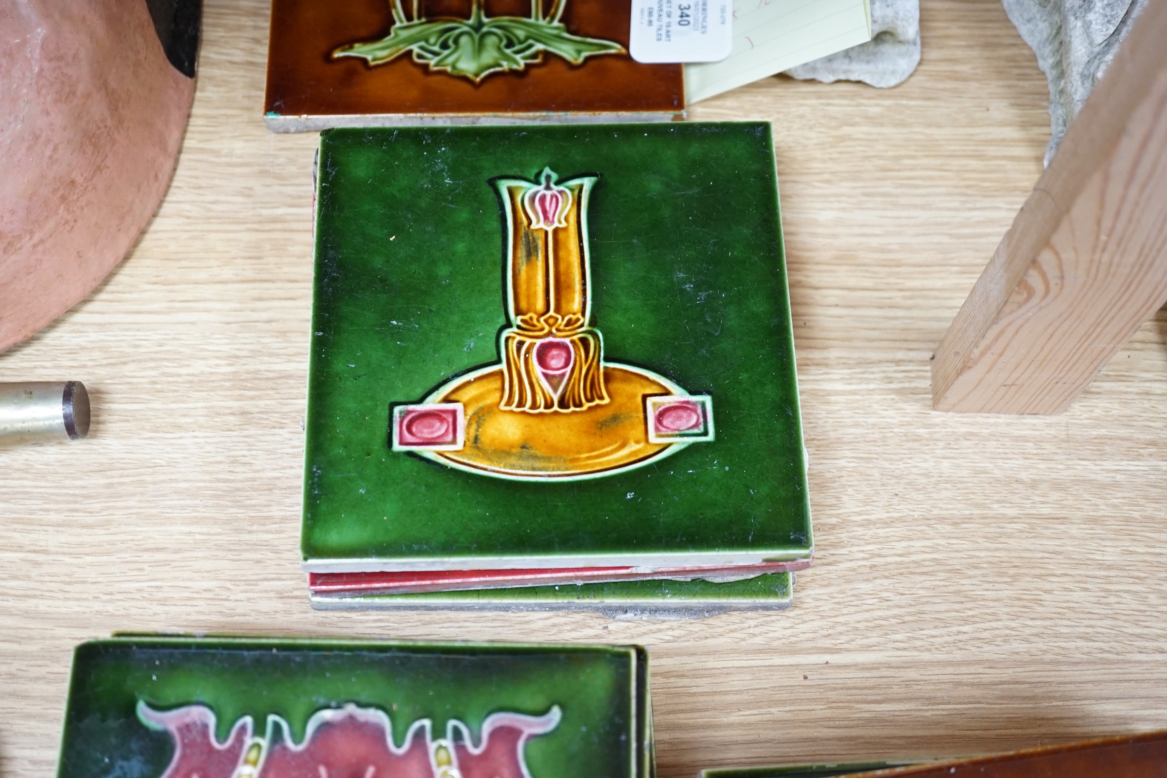 A set of 15 Art Nouveau tiles